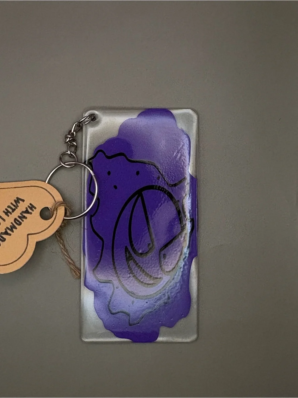 Ghastly Resin Dangle Keychain with Black Line Art